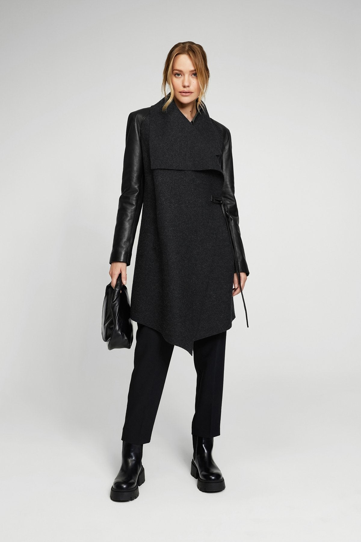Wool coat with leather top sleeves