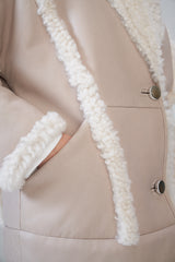 Manteau en peau lainée beige